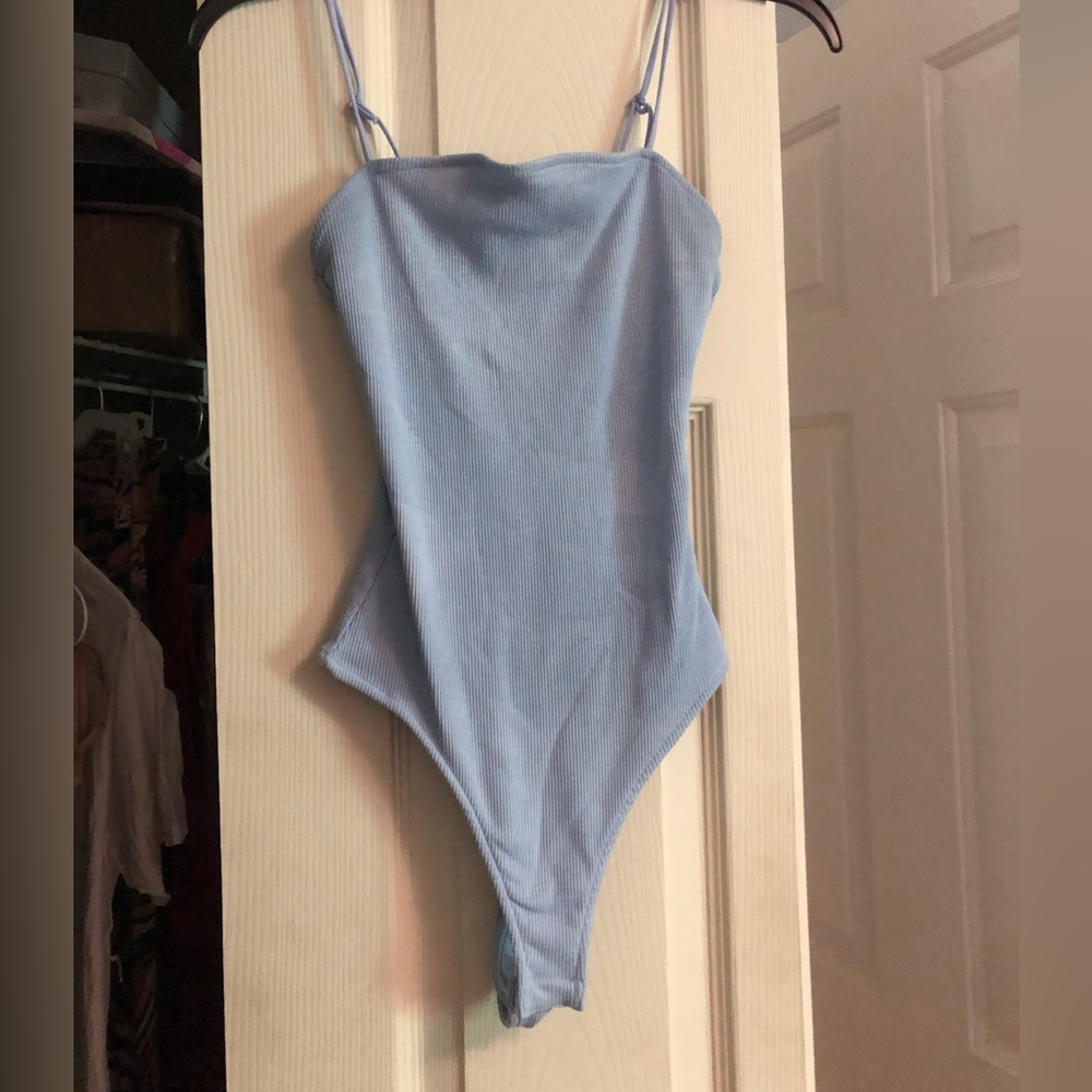 Sky blue body suit